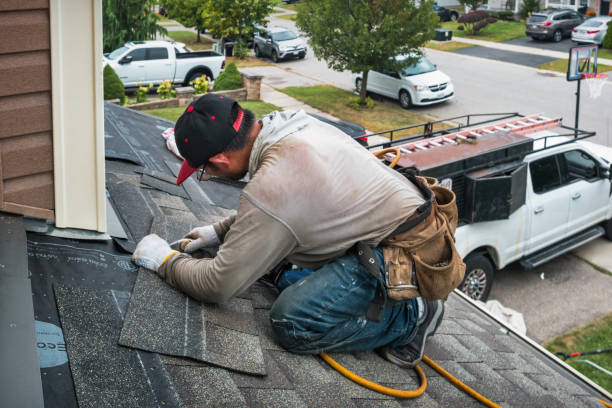 Professional Roofing technician working in Houston, OH